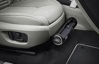 Umbrella holder under the front seat